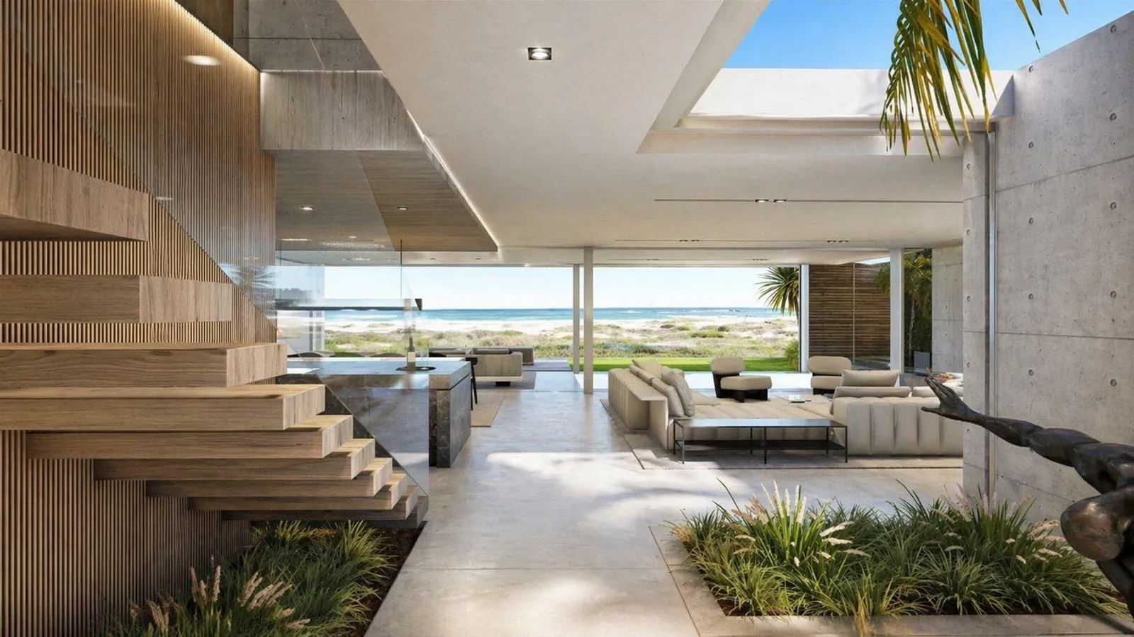 Entrance hall with floating timber staircase and sea views